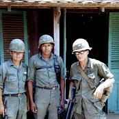 015                 Left to right: Alberto (Speedy) Ortiz, Edward Suniga 
                                   And platoon Medic ??. In front of 3rd platoon hut Rach Kien
                                   May 1967.
