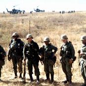 First or second squad geared up for a recon patrol out ofHelicopter training at Ft. Riley. SFC Tom Brown far left then Johnson,
                              George Kraus then ?,?,?.
