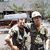 Wayne LeBreton and Bob Bennett in front of 3rd platoon hut.
                                   May 1967. I think that’s 1st platoon on the other side of the water
